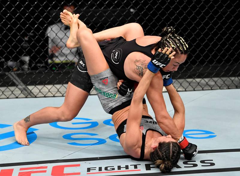 ABU DHABI, UNITED ARAB EMIRATES - JULY 26: (L-R) Carla Esparza punches Marina Rodriguez of Brazil in their strawweight fight during the UFC Fight Night event inside Flash Forum on UFC Fight Island on July 26, 2020 in Yas Island, Abu Dhabi, United Arab Emirates. (Photo by Jeff Bottari/Zuffa LLC via Getty Images) *** Local Caption *** ABU DHABI, UNITED ARAB EMIRATES - JULY 26: (L-R) Carla Esparza punches Marina Rodriguez of Brazil in their strawweight fight during the UFC Fight Night event inside Flash Forum on UFC Fight Island on July 26, 2020 in Yas Island, Abu Dhabi, United Arab Emirates. (Photo by Jeff Bottari/Zuffa LLC via Getty Images)