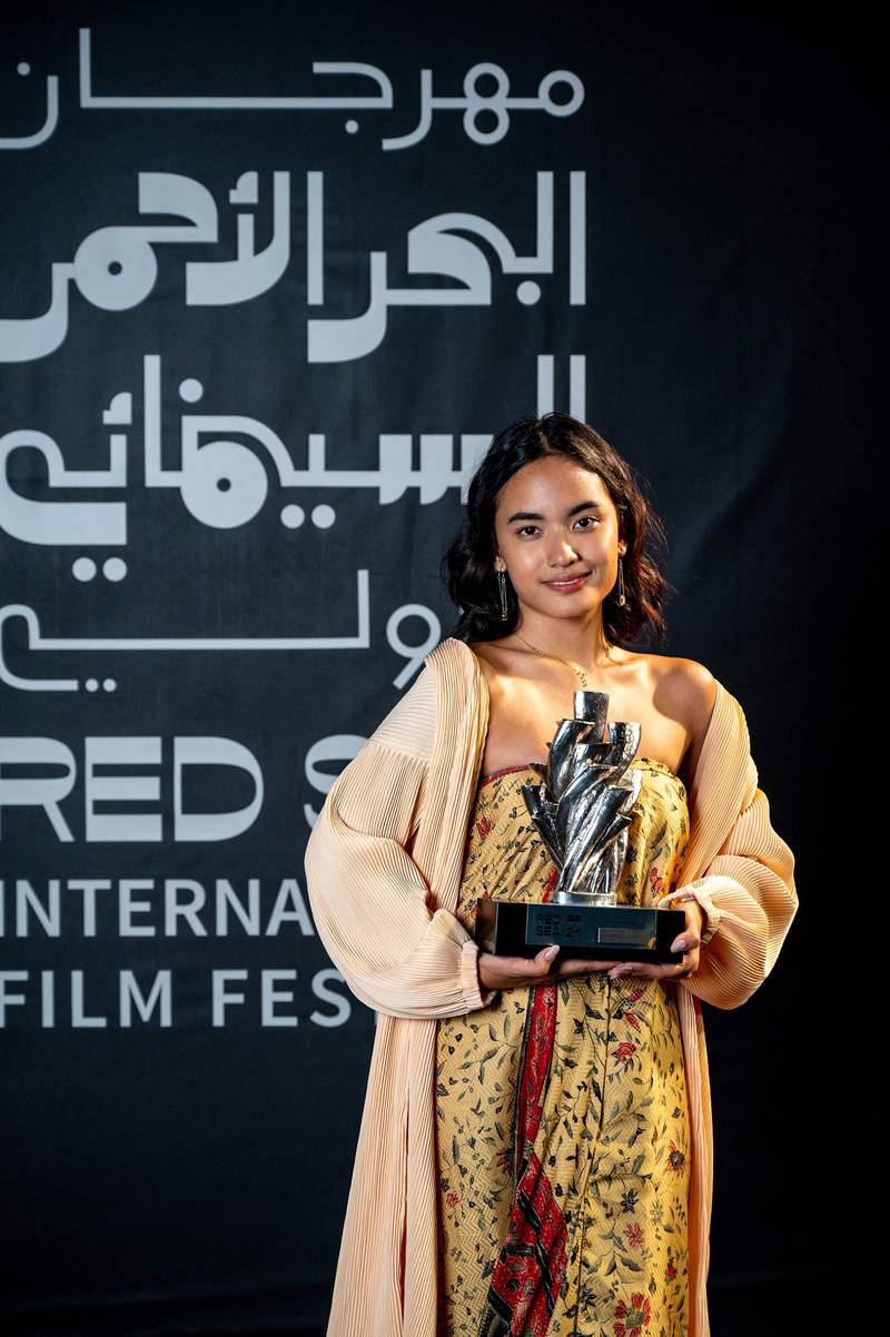 Indonesian actress Ara Winda Kirana posing with her Best Actress award for her role in the film 'Yuni'. Photo: Red Sea International Film Festival / AFP