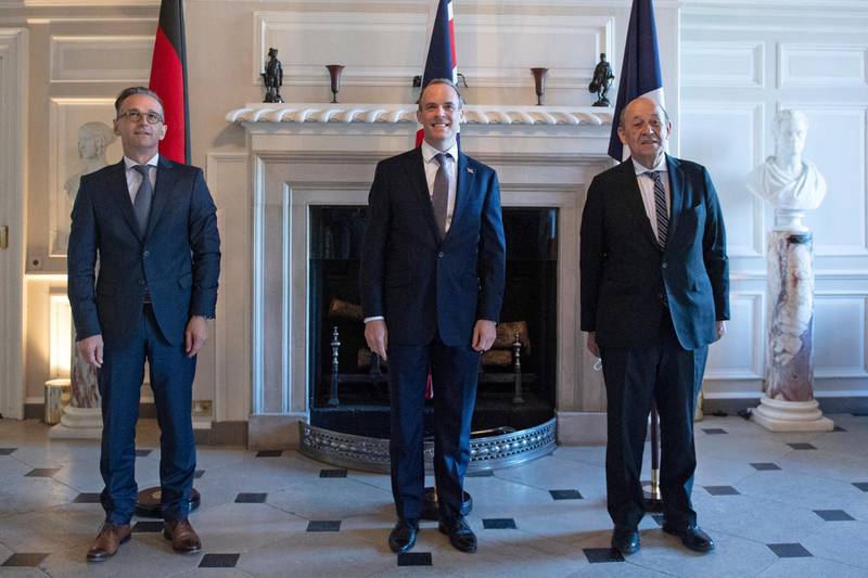 SEVENOAKS, ENGLAND - SEPTEMBER 10: (L-R) German Foreign Minister Heiko Maas, Britain's Foreign Secretary Dominic Raab and French Foreign Minister Jean-Yves le Drian pose for a photograph at Chevening House on September 10, 2020 in Sevenoaks, England. (Photo by Jutsin Tallis - WPA Pool/Getty Images)