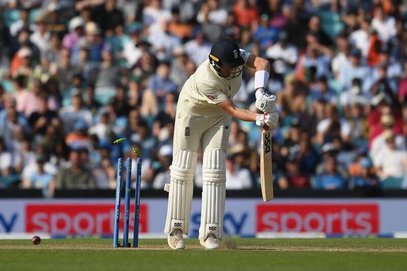 England's Craig Overton of England is bowled by Umesh Yadav for 10. Getty