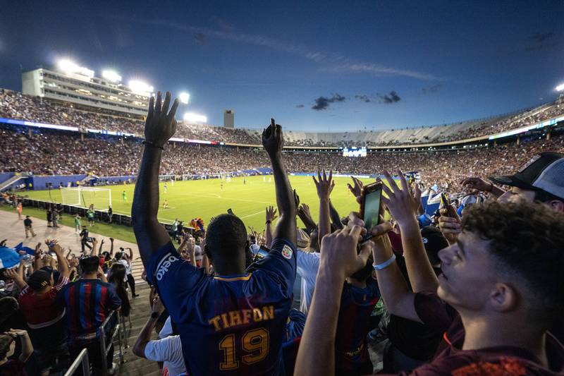 A packed crowd inside the Cotton Bowl watches the match between Barcelona and Juventus. AP