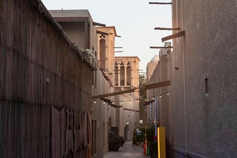 Older neighbourhoods, such as Al Fahidi in Dubai, tend to maintain cooler temperatures as their shaded pathways funnel breezes, researchers say. Antonie Robertson / The National

