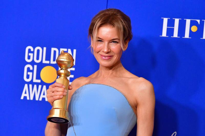 Renee Zellweger poses with her award for Best Performance by an Actress In A Motion Picture - Drama for her role in 'Judy', during the 77th annual Golden Globe Awards on January 5, 2020, at The Beverly Hilton hotel in Beverly Hills, California. AFP