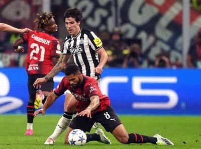 Newcastle United's Sandro Tonali challenges AC Milan's Ruben Loftus-Cheek at the San Siro. PA