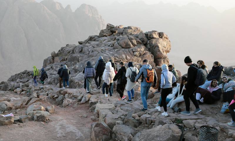 Tourists make their way towards the monastery of Saint Catherine, after watching the sunrise on top of Mount Moses, in Saint Catherine city, South Sinai, Egypt. EPA