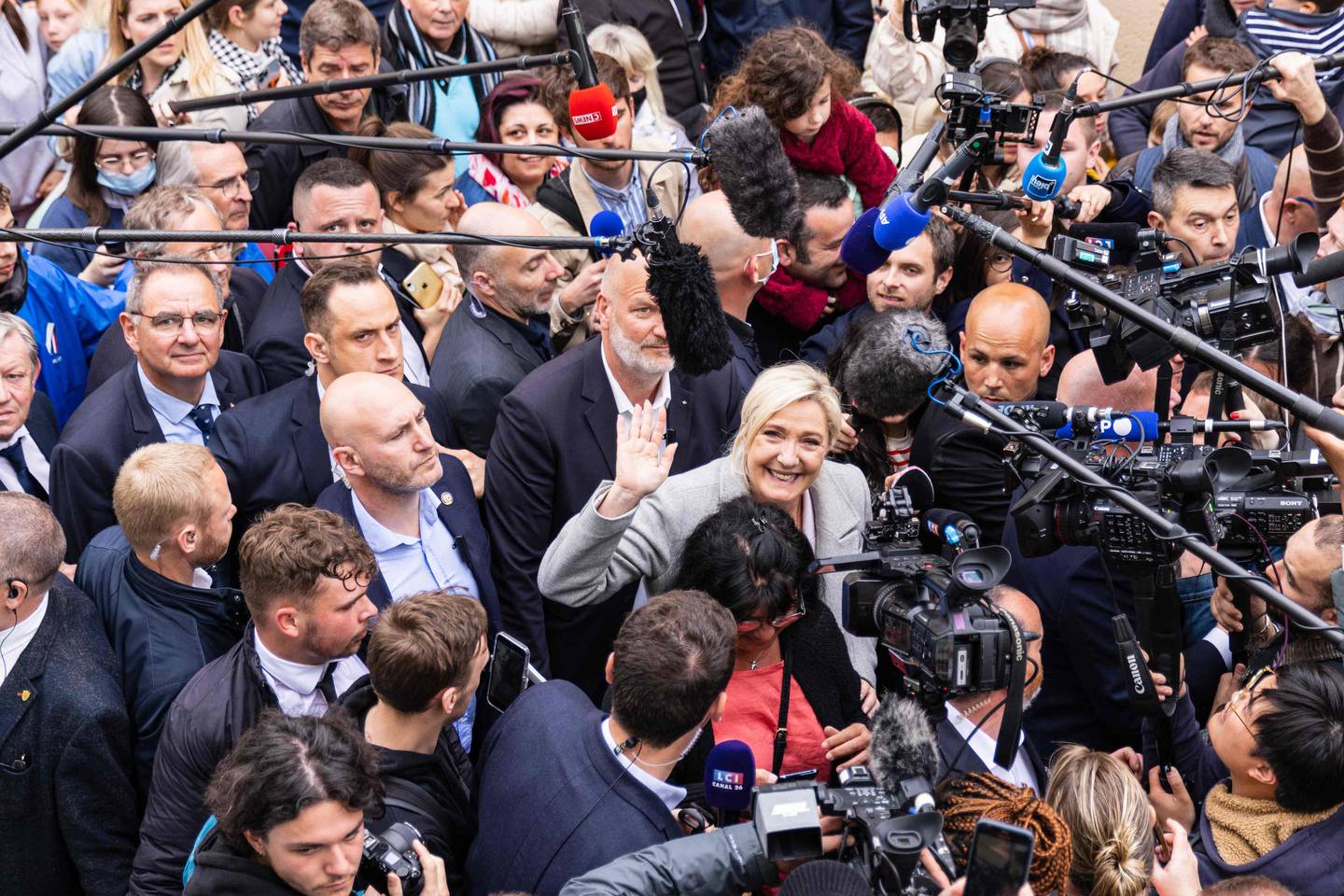 Marine Le Pen was mobbed by voters and cameras during a visit to Normandy on Monday. AFP 