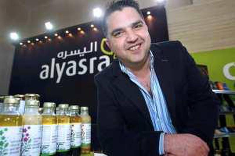 DUBAI. 24th February  2010. Khalid Hajjar, Regional Manager for AlYasra Food Company at their stand at the Gulfood exhibition in Dubai yesterday(weds)  Stephen Lock   /  The National  FOR BUSINESS