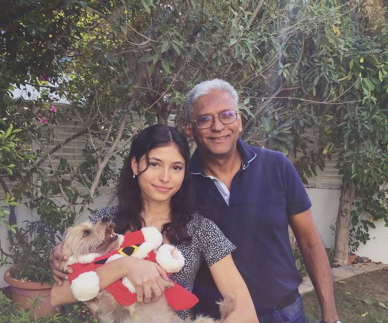 Melina Aggarwal with her father in Dubai during Christmas 2020.