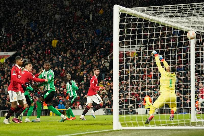 Manchester United's Bruno Fernandes, centre, scores his side's third goal. AP