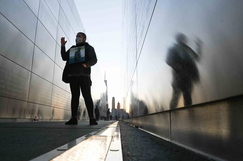 Claudia Castano speaks about her memory of her brother German who's name is etched at the Empty Sky 9/11 Memorial in Liberty State Park in Jersey City, New Jersey.  AFP
