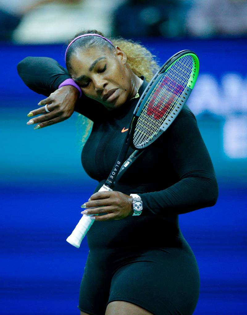 Serena Williams composes herself before returning serve. EPA