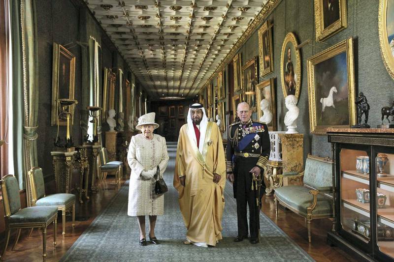 Britain's Queen Elizabeth and Prince Philip, greet the President of the United Arab Emirates, Sheikh Khalifa bin Zayed al-Nahayan (C), at Windsor Castle in southern England April 30, 2013. The President is paying a state visit to Britain from April 30 to May 1. REUTERS/Oli Scarff/pool   (BRITAIN - Tags: ROYALS POLITICS SOCIETY ENTERTAINMENT) *** Local Caption ***  LON700_BRITAIN-_0430_11.JPG