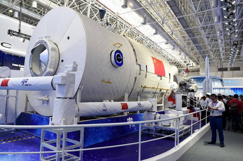 (FILES) This file photo taken on November 6, 2018 shows a partial model of Chinese space station on display at the Airshow China 2018 in Zhuhai, south China's Guangdong province. China has postponed the planned launch on May 20, 2021 of a rocket carrying supplies for its new space station due to technical reasons, state media said. / AFP / WANG ZHAO

