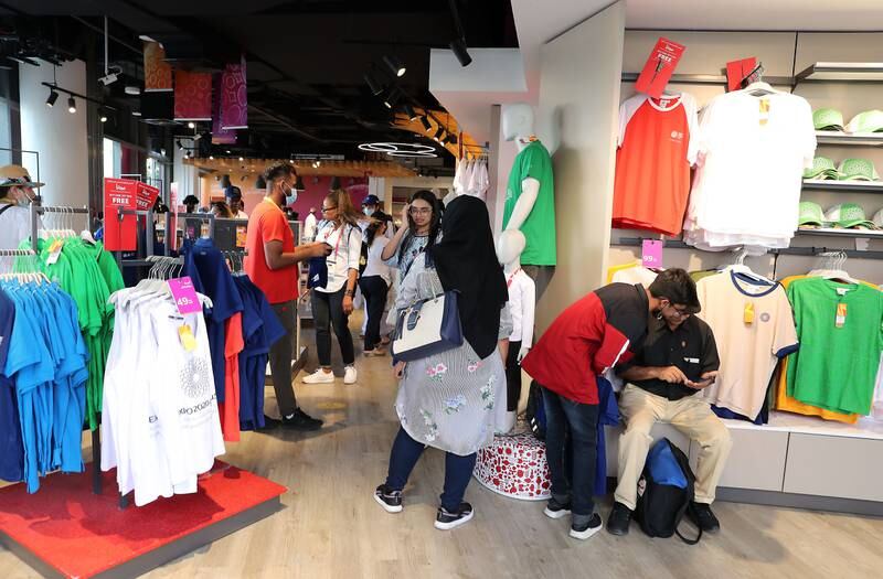 People flock to the merchandise outlet on the last day of Expo 2020 Dubai. Pawan Singh / The National