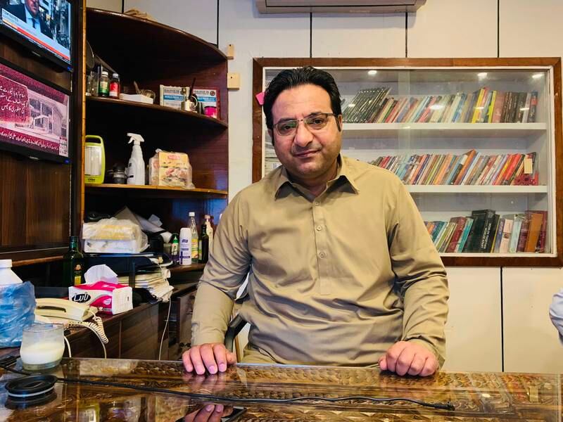 Fayaz Zafar, a journalist who has covered the Taliban insurgency in Swat, poses for a picture in his office in Mingora.