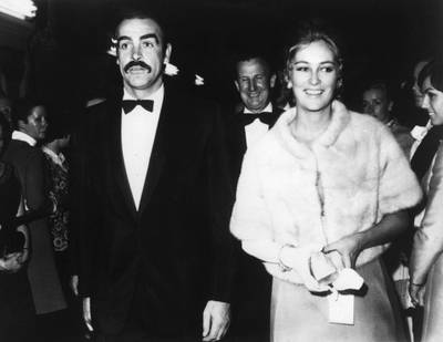 US actor Sean Connery and Princess Paola of Belgium arrive for the premiere of the film "Sahlako", 31 October 1968 in Belgium.. (Photo by - / BELGA / AFP)