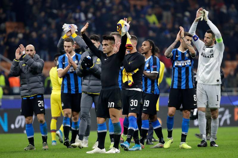 Inter Milan players applaud fans at the end of the match. AP