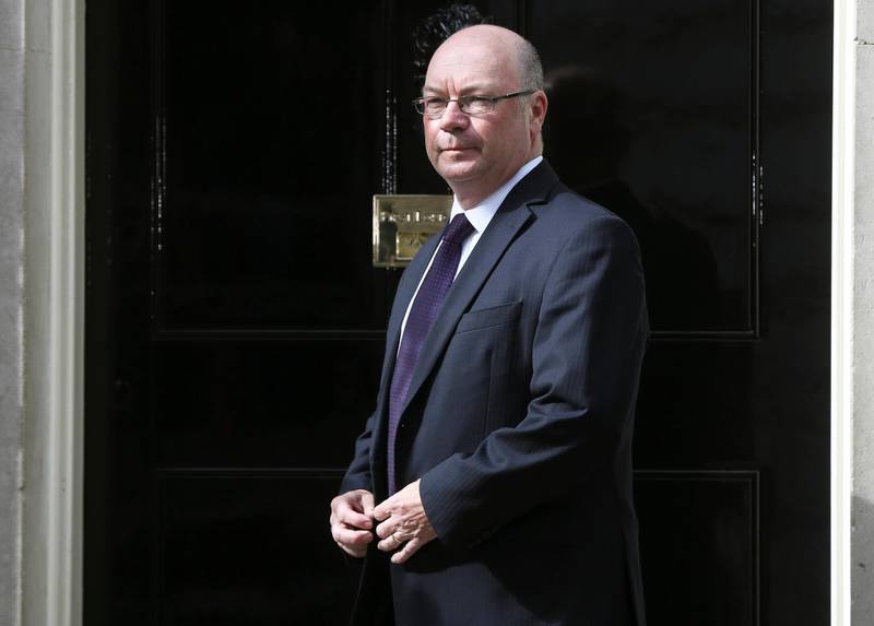 FILE PHOTO: Alistair Burt arrives at 10 Downing Street as Britain's re-elected Prime Minister David Cameron names his new cabinet, in central London, Britain May 11, 2015.    REUTERS/Neil Hall/File Photo
