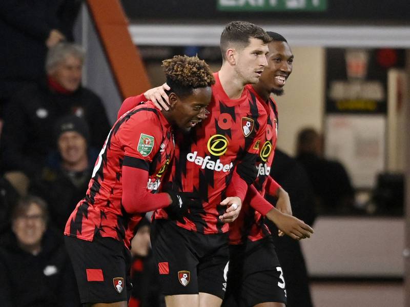 Bournemouth's Jamal Lowe celebrates scoring their first goal with Chris Mepham. Reuters