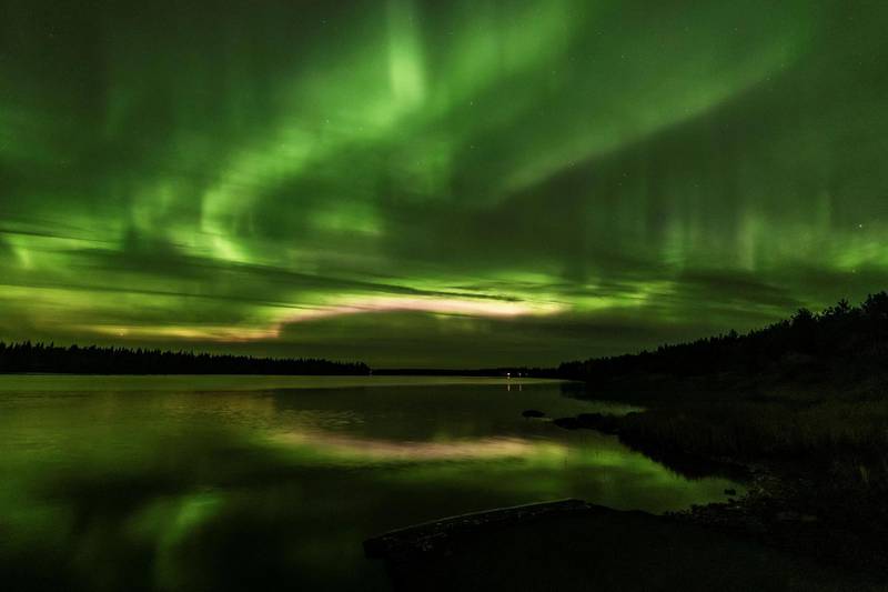 The Aurora Borealis (Northern Lights) is seen over the sky near Rovaniemi in Lapland, Finland September 25, 2020. Picture taken September 25, 2020. REUTERS/Alexander Kuznetsov     TPX IMAGES OF THE DAY