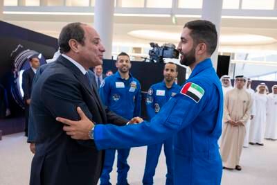 Mr El Sisi greets UAE astronaut Mohamed Al Mulla during the homecoming ceremony