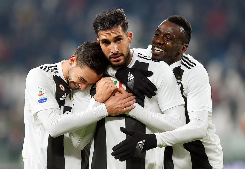 Emre Can is congratulated by teammates. Reuters