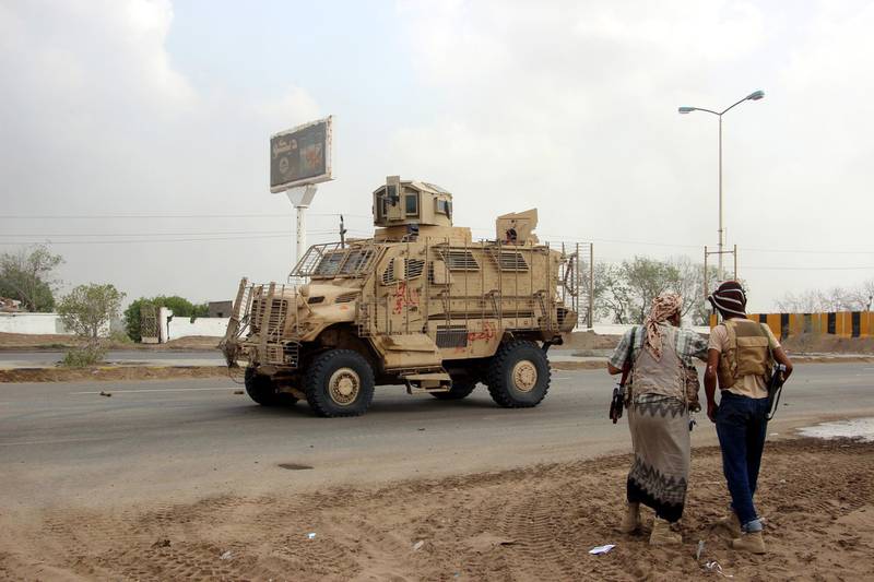 Yemeni government forces take part in battles at the port city of Hodeidah. EPA