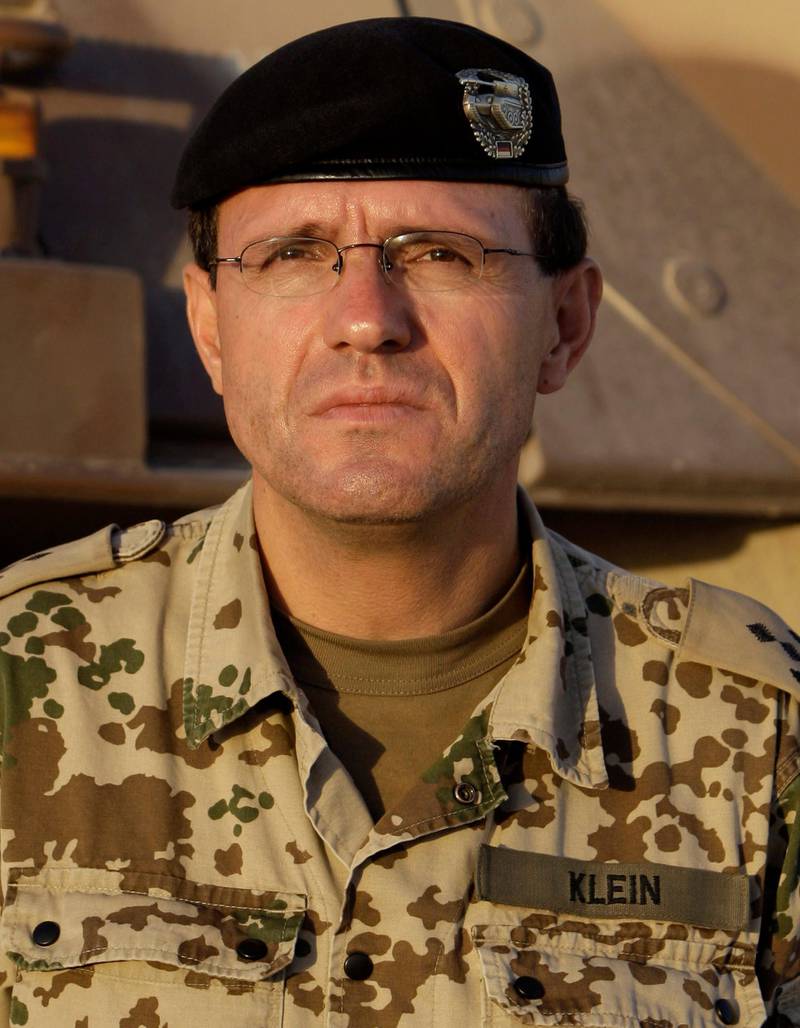 FILE - In this Sept. 6, 2009 file picture, German colonel Georg Klein is pictured at the German base in Kunduz, Afghanistan. The European Court of Human Rights on Tuesday rejected an Afghan man's case against German authorities' refusal to prosecute an officer who ordered the deadly bombing in 2009 of two fuel tankers in northern Afghanistan.(AP Photo/Anja Niedringhaus, File)