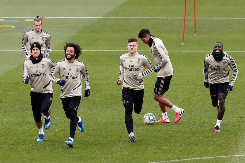 From left - Real Madrid's James Rodriguez, front, Gareth Bale, Marcelo Vieira, Luka Jovic, Raphael Varane and Ferland Mendy during training in February. EPA