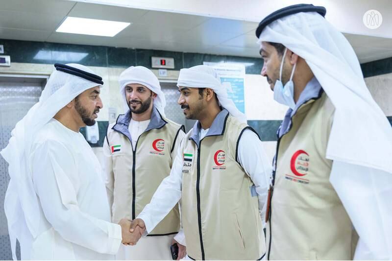 Sheikh Hamdan meets members of Emirates Red Crescent. 