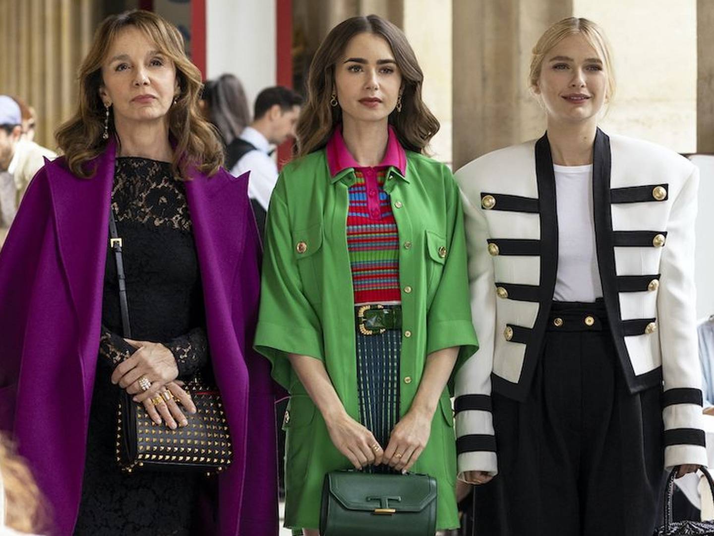 Lily Collins, centre, as Emily Cooper in 'Emily in Paris', wears a green jacket by Lebanese designer Elie Saab in season two. Photo: Netflix
