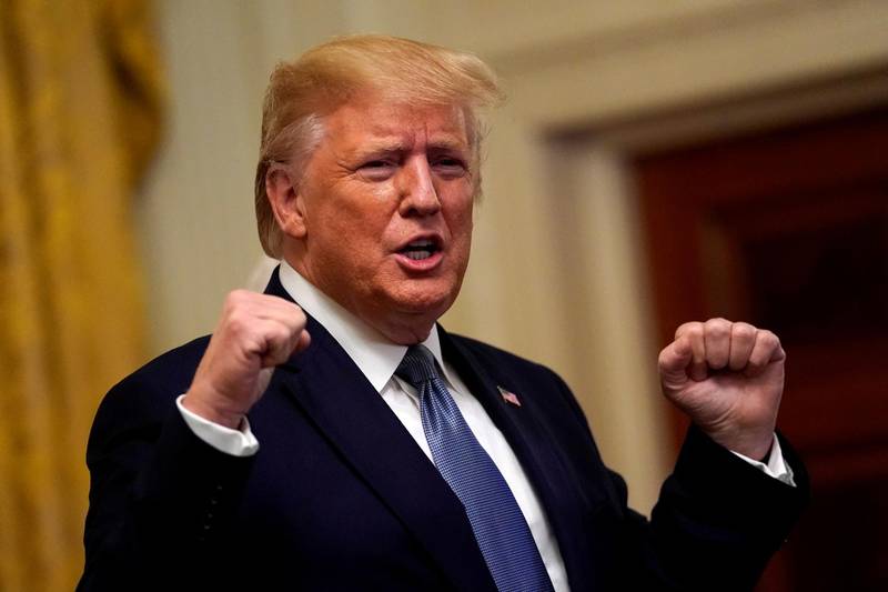 FILE PHOTO: U.S. President Donald Trump greets the audience before delivering remarks at Young Black Leadership Summit at the White House in Washington, U.S., October 4, 2019. REUTERS/Yuri Gripas/File Photo