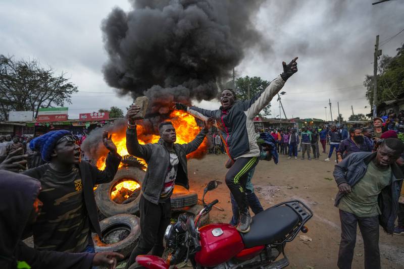 Chanting "No Raila No Peace," supporters of Kenyan opposition leader Raila Odinga burn tyres in the Kibera neighbourhood of the capital Nairobi. AP Photo