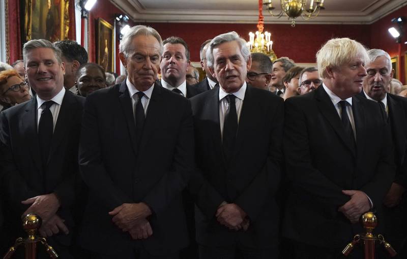 From left, Labour leader Sir Keir Starmer and former British prime ministers Tony Blair, Gordon Brown and Boris Johnson attend the Accession Council ceremony. AP