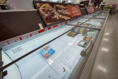 An empty freezer section at Sainsbury's Nine Elms in London. PA