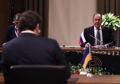Russian Foreign Minister Sergei Lavrov, right, and Ukranian Foreign Minister Dmytro Kuleba before their meeting during the Antalya Diplomacy Forum in Antalya, Turkey, on March 10. EPA