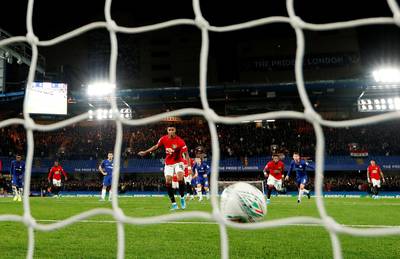 Manchester United's Marcus Rashford scores their first goal from the penalty spot. Reuters