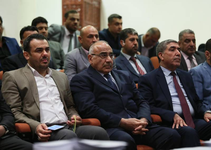 epa07065176 A handout photo made available by the Iraqi Parliament Office shows Adel Abdul Mahdi (2-L), the newly appointed Prime Minister attending a press conference at the headquarter of Iraqi parliament in Baghdad, Iraq, 02 October 2018. According to media reports, Iraq's parliament has elected Barham Salih as the new president on 02 October 2018. Barham Salih was running against the Kurdistan Democratic Party's (KDP) candidate, Fuad Hussein who withdrew from the second round of vote, moments before the announcement of election results.  EPA/IRAQI PARLIAMENT HANDOUT  HANDOUT EDITORIAL USE ONLY/NO SALES