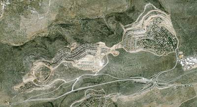 A handout photo made available by the Peace Now organization showing an aerial view of the Israeli settlement of Leshem-Alei Zahavm in the West Bank.  EPA