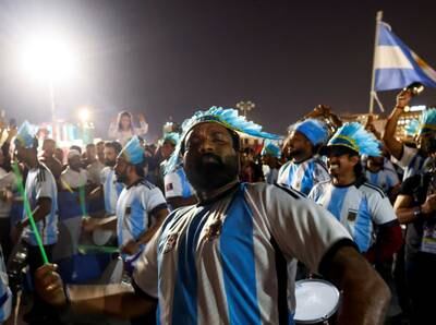 Argentina fans dance with drums at a popular tourist area in Souq Waqif. Reuters