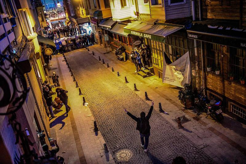 A lone protester confronts riot police in the streets of Istanbul. AFP