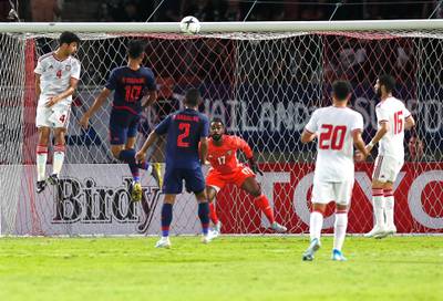 Thailand's Teerasil Dangda, second right, scores the opening goal. EPA