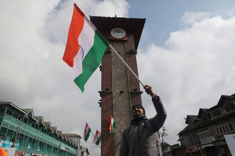 India's national flag is waved in front of the clock tower in Lal Chowk square during celebrations for the country's 23rd Republic Day in Srinagar, the summer capital of Indian Kashmir. EPA