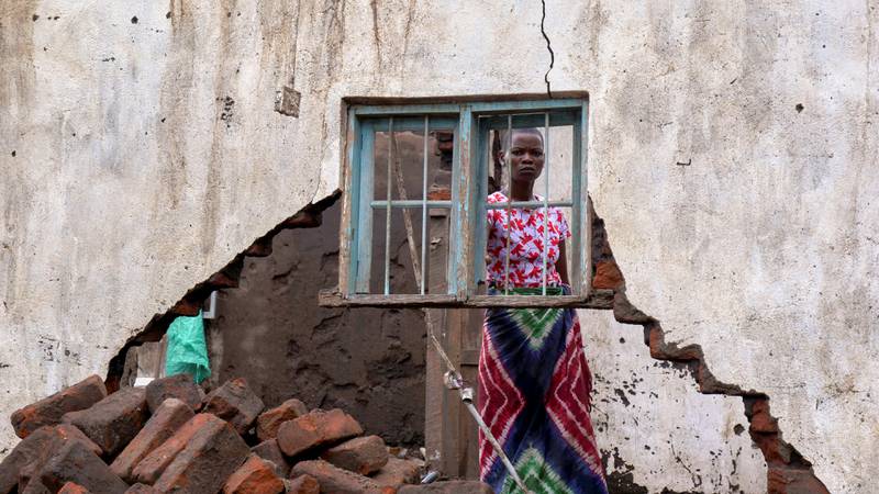 A woman looks at her house which has been destroyed by tropical storm Ana, in Chikwawa district in southern Malawi. Reuters
