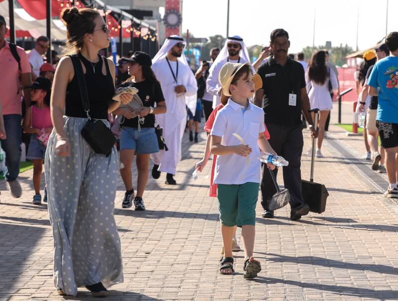 A young racing fan at the F1 fan zone at Yas Marina Circuit. 