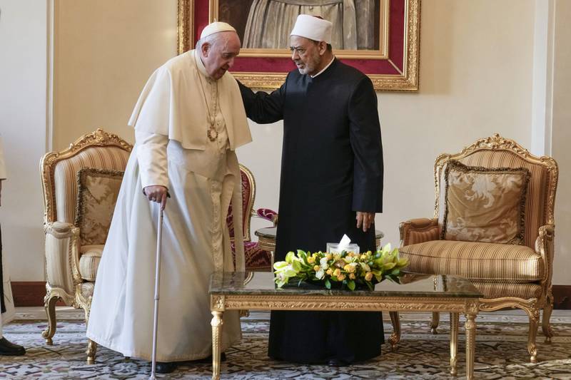 Pope Francis is greeted by Ahmed El-Tayeb, Grand Imam of al-Azhar, as he arrives for a meeting with the members of the Muslim Council of Elders at the Mosque of Sakhir Royal Palace, Bahrain. AP Photo