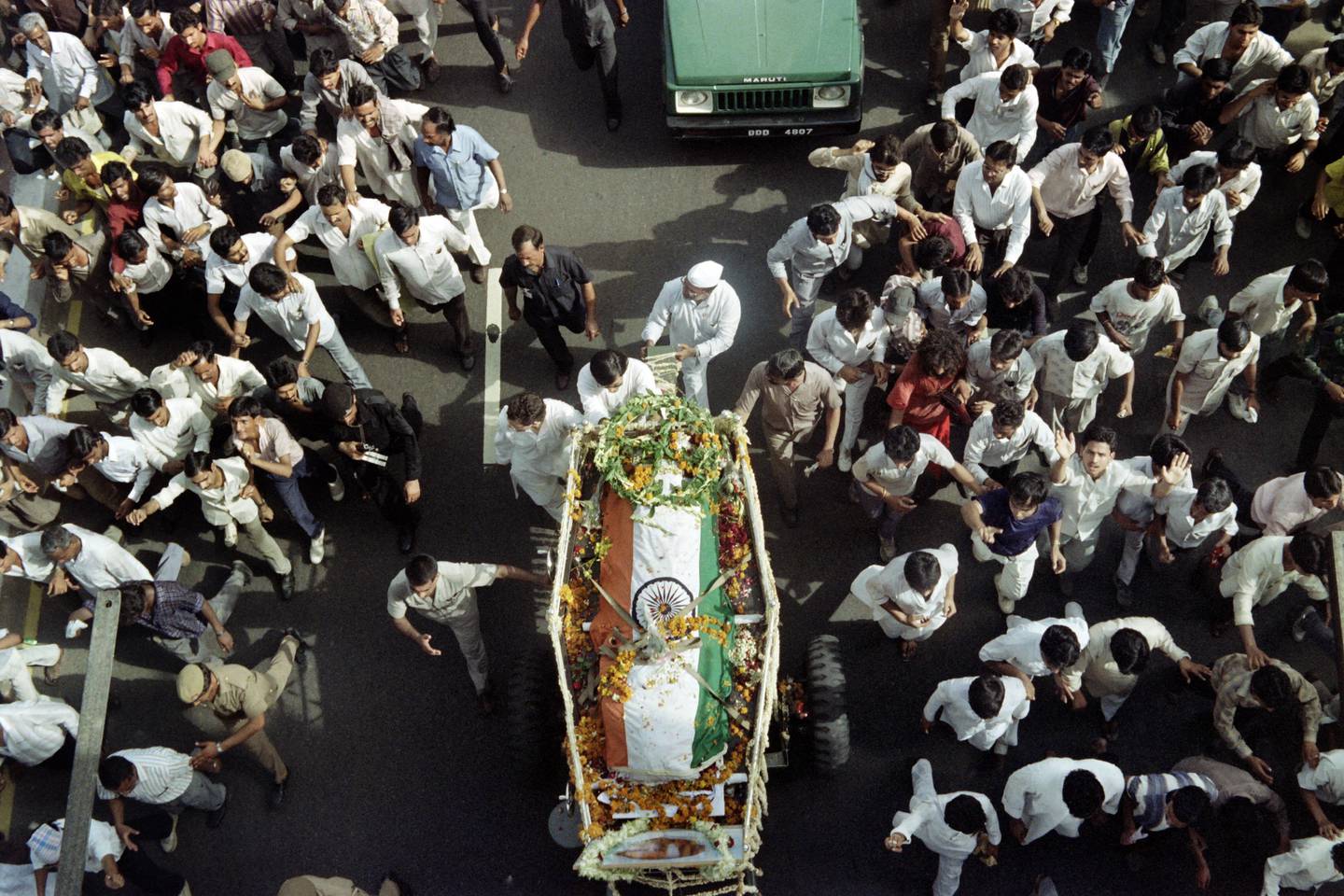 The funeral procession for slain prime minister Rajiv Gandhi moving through the crowded streets of New Delhi in May 1991. AFP