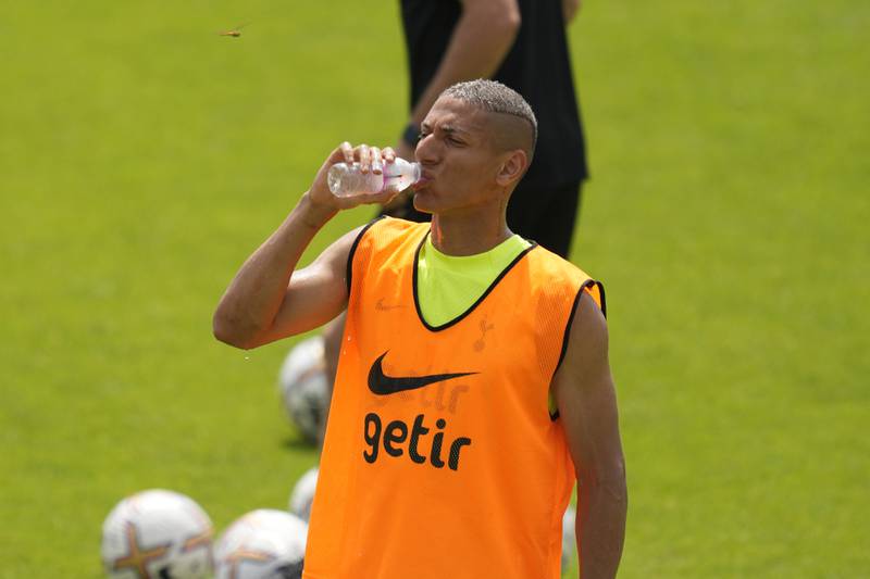 Tottenham's Richarlison drinks water during a training session. AP Photo 