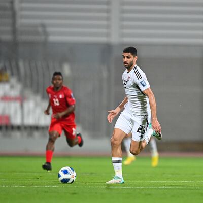 Sultan Adil runs with the ball for the UAE in Bahrain. Photo: UAE FA