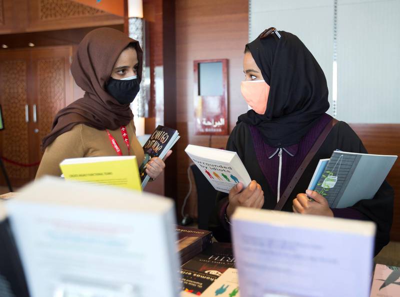 Duba, United Arab Emirates -  Book enthusiasts checking out books from different authors at the Emirates Airline Festival of Literature at InterContentinental Hotel Dubai Festival City.  Leslie Pableo for The National for Razmig's story